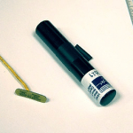A largemouth bass radio tag and tansmitter